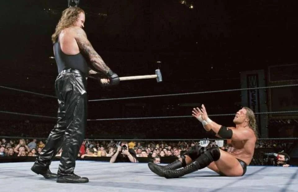 Picture Of Triple H Vs The Undertaker