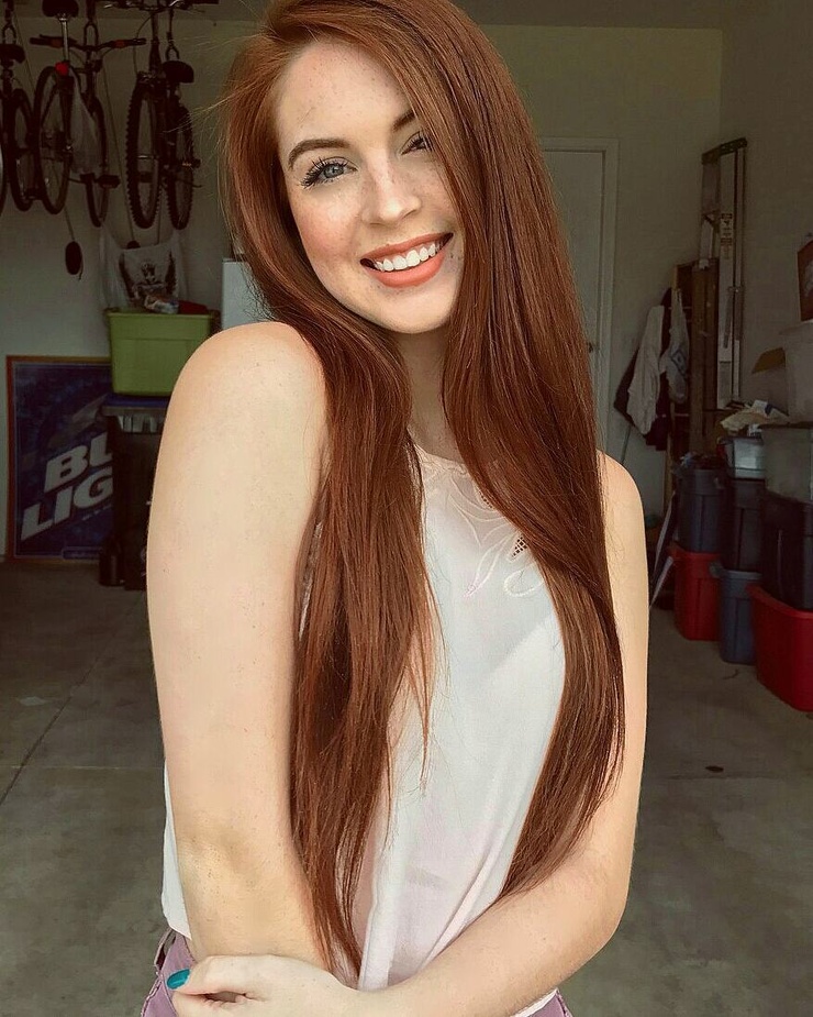 Secretary cute redhead long hair