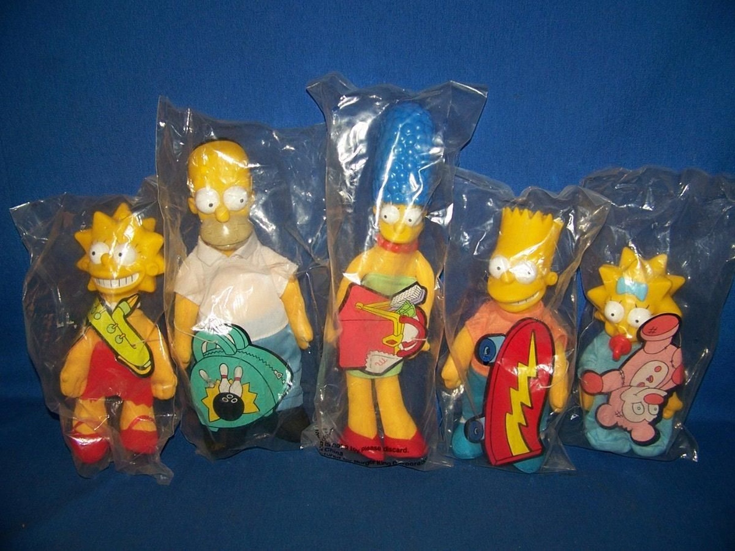 Collection of Five Burger King Simpson Doll Figures: Homer, Marge, Bart, Lisa and Maggie