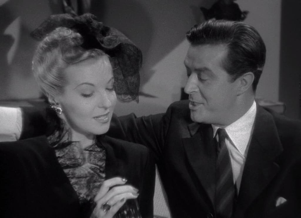 Hillary Brooke and Ray Milland