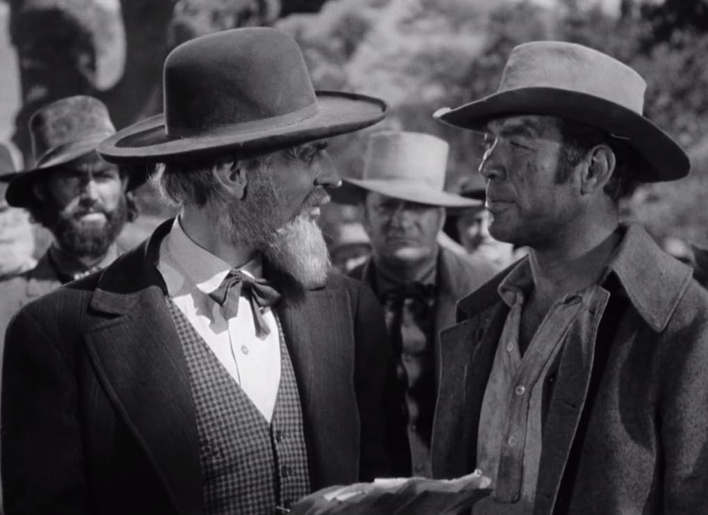 Raymond Massey and Ward Bond