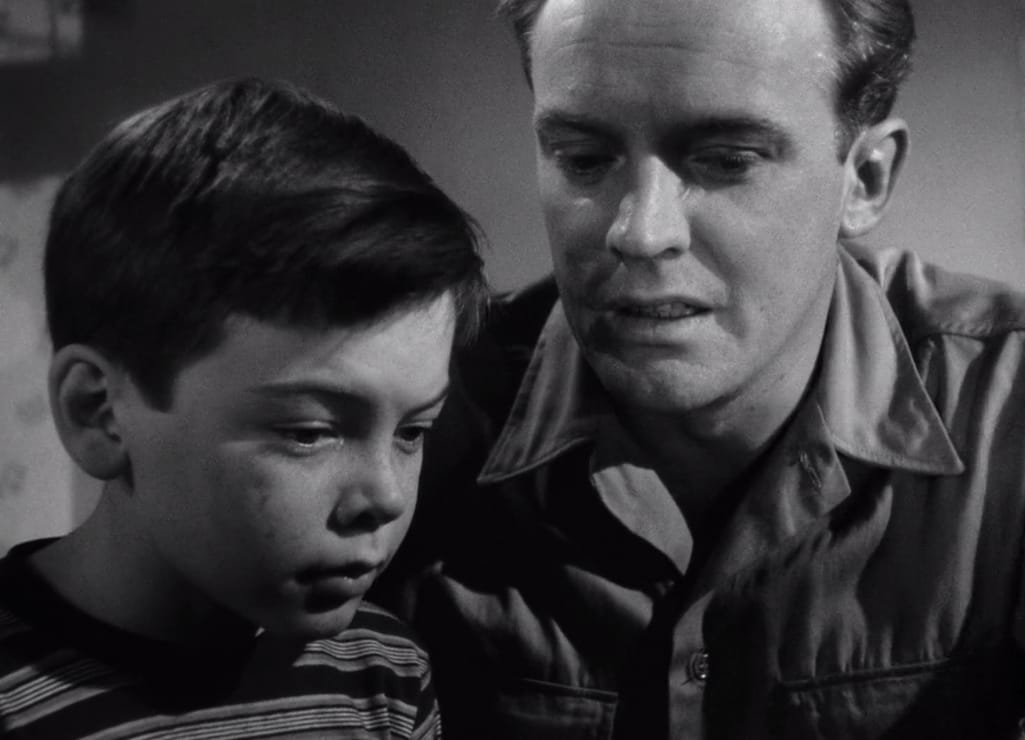 Bobby Driscoll and Arthur Kennedy