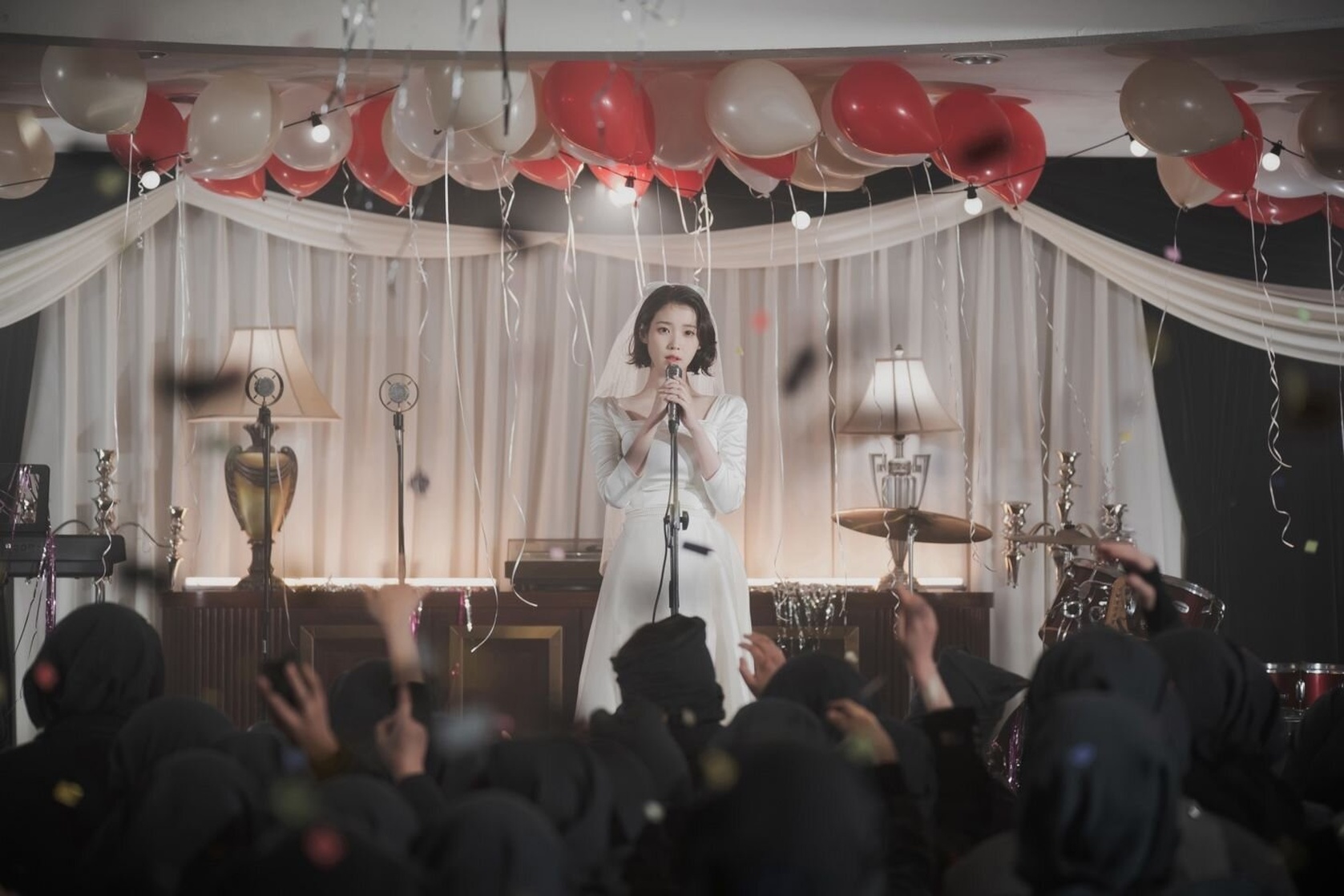 IU