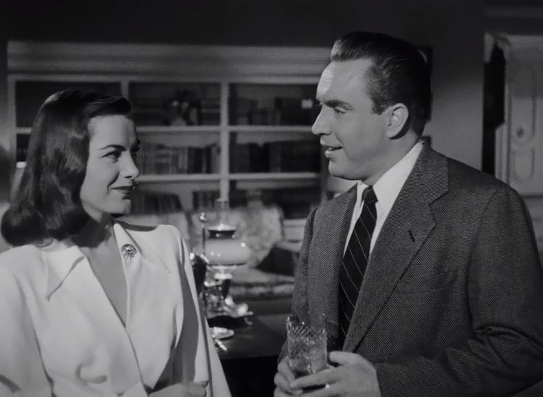 Ella Raines and Edmond O'Brien