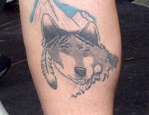 Татуировка волк смешная