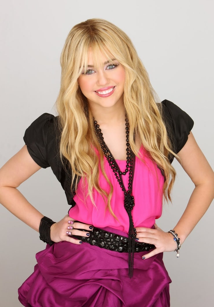 Miley Cyrus as Hannah Montana.