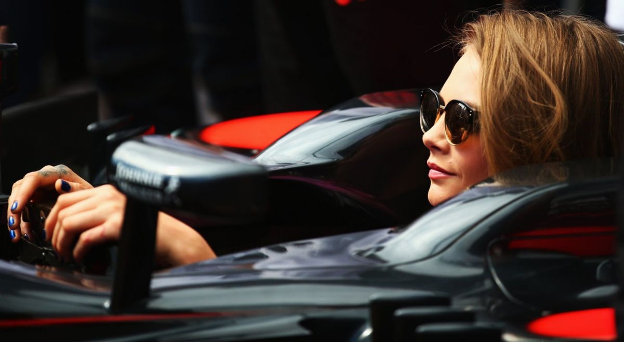 CARA DELEVINGNE at McLaren Honda Garage in Pitlane