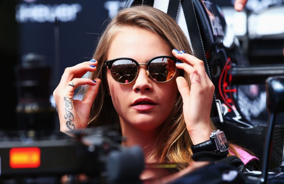 CARA DELEVINGNE at McLaren Honda Garage in Pitlane