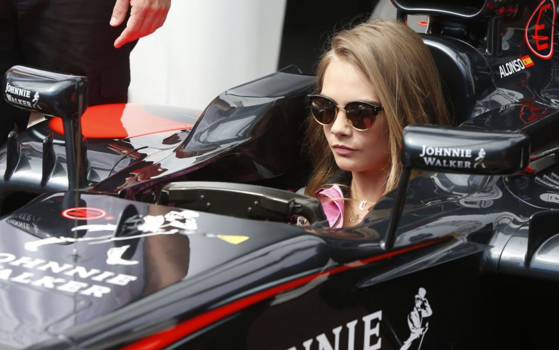 CARA DELEVINGNE at McLaren Honda Garage in Pitlane