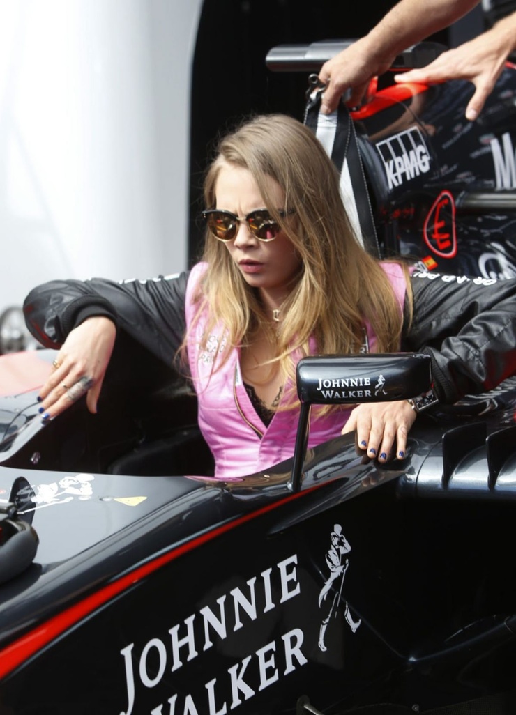 CARA DELEVINGNE at McLaren Honda Garage in Pitlane
